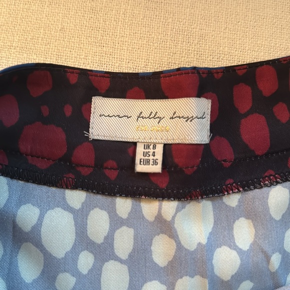 Never Fully Dressed size 4s/small multi colored flowy skirt - Picture 3 of 4